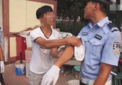 闯红灯反讹交警390元 在欧美国家违法后买保险会涨价