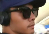 陈伟霆休假晒成炭?