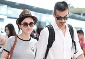 杨子姗婚后机场首秀 与老公感情甚好亲密相偎画面甜到齁